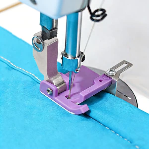 Trykkfot i solid stål forbedrer stoffkontroll ved quilting