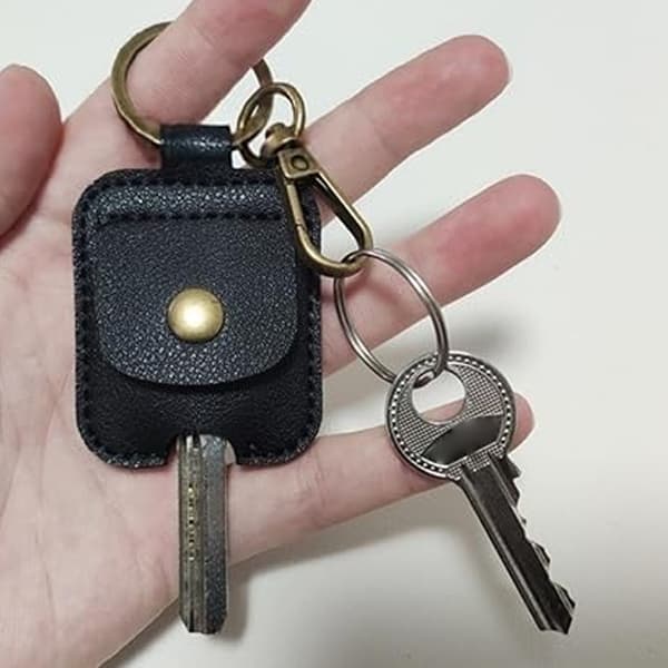 Moderne Snap Lock Nøglering PU Læder Tekstur Nøglering Egnet til Mænd Kvinder