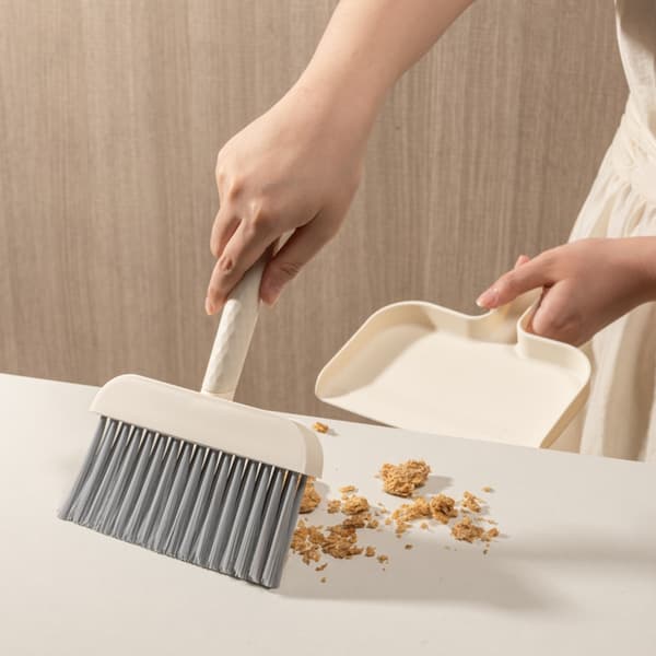 Feiesett for støvbrett med ergonomisk grep
