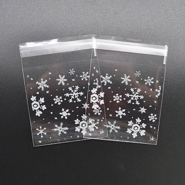 50 st Snöflinga Jul Plast Godis Kakor Kex Snacks Förpackningspåse Självhäftande Presentpåsar för Hem Bröllop Födelsedagsfest 7x7cm