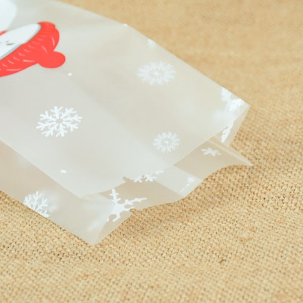25/50 st Söt snögubbe Plastpresentpåsar Godis Cookie Bakning Förpackningspåse Jul Nyår Vinterfest Dekoration Favors 50pcs