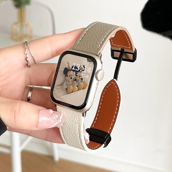 Kellon ranneke Apple Watch iWatchille 1/2/3 42mm Litsi-kuvio magneettisella imulla - harmaa ja maitomainen valkoinen