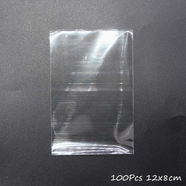 100 stk. Gennemsigtige plastikposer til slik, slikkepinde, kager, indpakning, cellofanposer, jule-, bryllups-, fødselsdagsfest, gavepose out of stock1