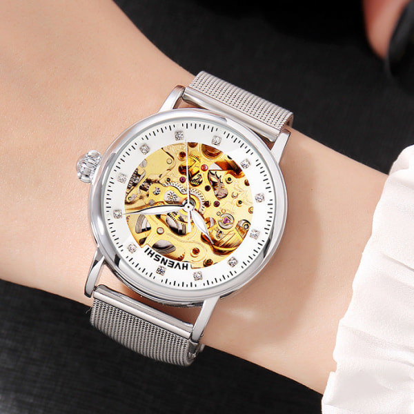 Huangshi Watch Women's Hollow Luminous Automatic Mechanical Watch Modebälte Business Watch Four-Leaf Clover white steel belt