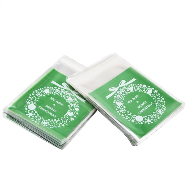 50/100 st Kakpresentpåsar Jul Tomte Snögubbe Snacks Kaka Plastförpackningspåsar Fest Bröllop Godispåse Barn Favorit Santa Claus 100pcs