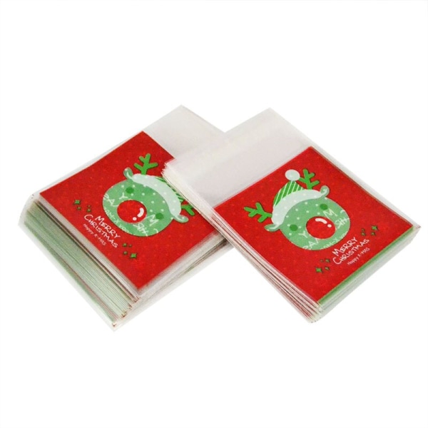 50/100 st Kakpresentpåsar Jul Tomte Snögubbe Snacks Kaka Plastförpackningspåsar Fest Bröllop Godispåse Barn Favorit Reindeer 50pcs