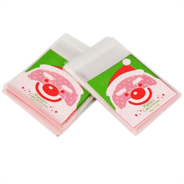 50/100 st Kakpresentpåsar Jul Tomte Snögubbe Snacks Kaka Plastförpackningspåsar Fest Bröllop Godispåse Barn Favorit Reindeer 50pcs