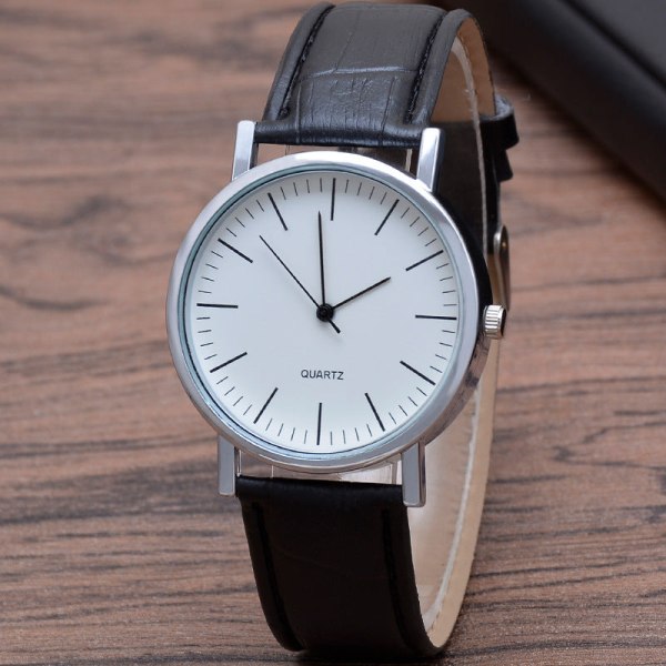Gave Tre Øyne Herreklokke Herre Quartz Klokke Blått Lys Glass Rem Klokke Herreklokke A white surface black belt