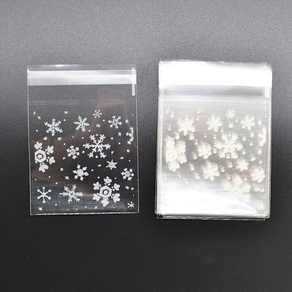 50 st Snöflinga Jul Plast Godis Kakor Kex Snacks Förpackningspåse Självhäftande Presentpåsar för Hem Bröllop Födelsedagsfest 10x10cm