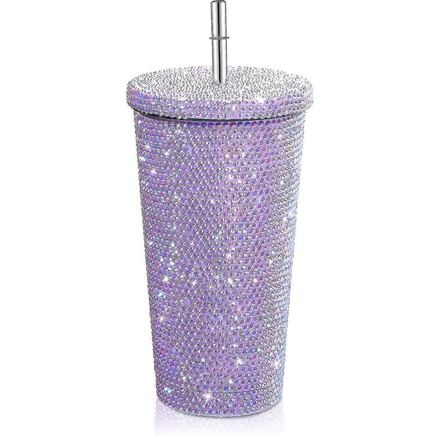 Kimalteleva timanttimuki, glittervesipullo kannella -