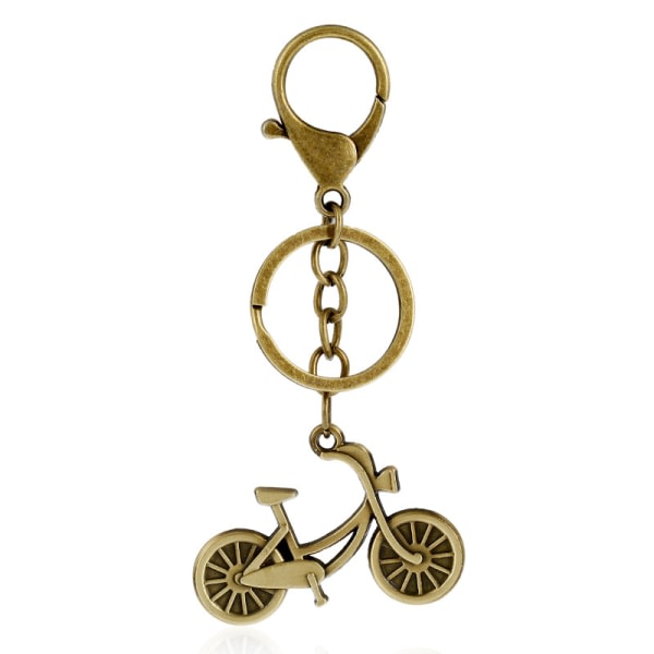 Vacker nyckelring i Steampunk-stil -  Cyckel