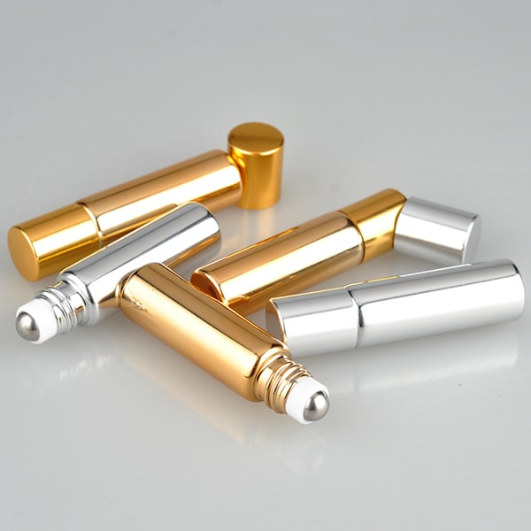 7 st påfyllningsbara parfymflaskor i glas, eterisk olja, rollerflaskor, bärbara lätta tomma roll-on-flaskor för resor, 10 ml, gyllene