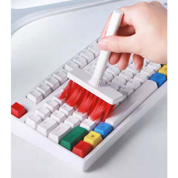 Røde ørepropper rengøring pen computer sprække artefakt fem-delt tastatur rengøring børste