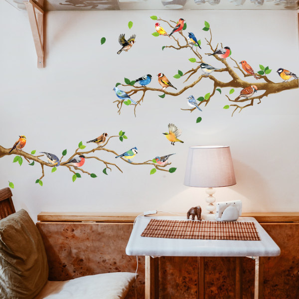 Kolibri på grenväggklistermärke, grönt blad och flygande