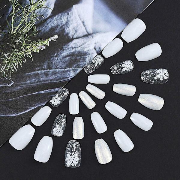 Julefalske negler hvite korte falske negler snø glitter trykk