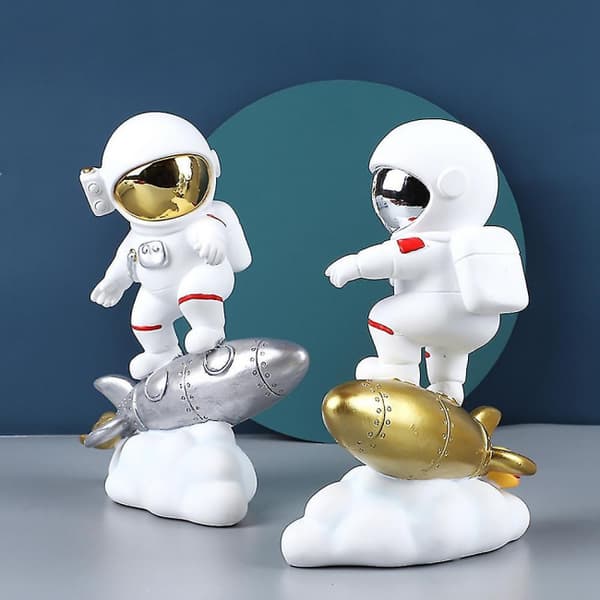 Gull astronaut på rakettstatue Hjemmedekorasjon Samlerstatue