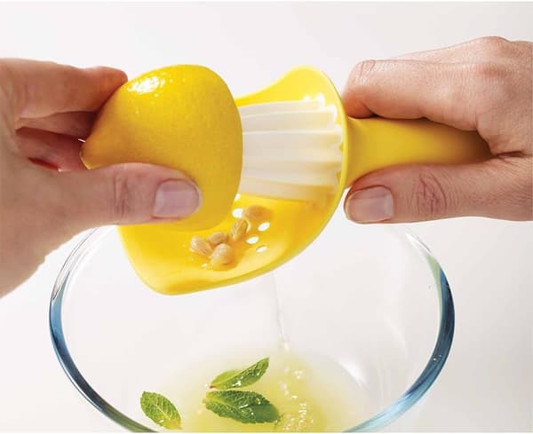Manuel citruspresser, citronpresser, appelsin- og limepresser med kop til opsamling af kerner, grøn