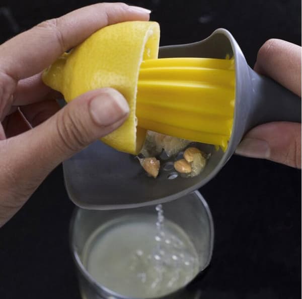 Manuel citruspresser, citronpresser, appelsin- og limepresser med kop til opsamling af kerner, grøn