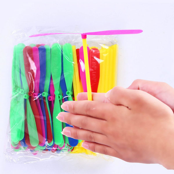 50 Stycken Bambu Trollslända Handgnuggning Plastpropeller Utomhusleksak Barnpresent Flygande (Slumpmässig Färg)
