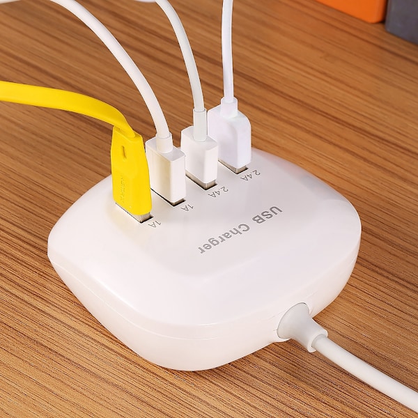 Kompakt AC100-240V 4-portars USB-snabbladdare Adapter Fickstorlek Resor Hemmakontor