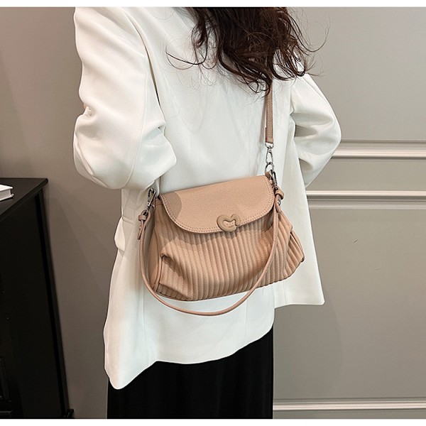 Niche-design, suosittu laskostettu pieni neliölaukku, yksinkertainen ja raikas olkalaukku, joka sopii moneen asuun, crossbody-laukku