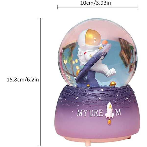 Rymdastronautsmusikalisk snöglob, 100 mm dekorativ bordsnöglob i harts med färgglada lampor och automatiska snöflingor