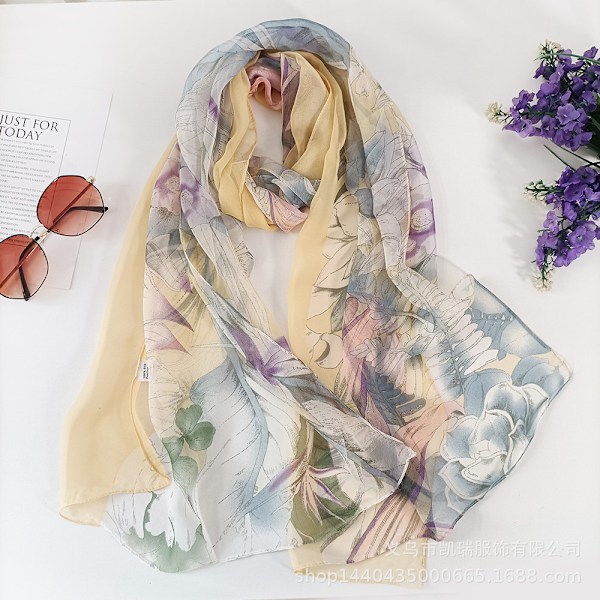 Unike florale skjerf for kvinner: Chiffon florale og fugletrykte skjerf med levende farger og delikat tekstur.