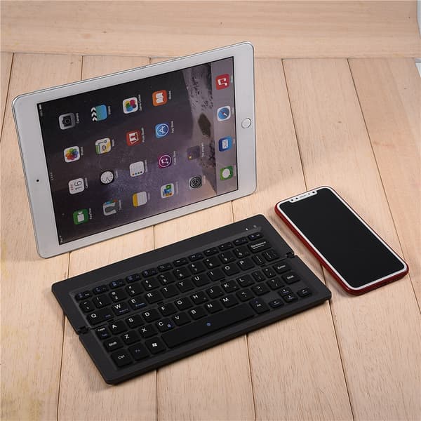Mini bærbar magnetisk foldbar vandtæt Bluetooth trådløst tastatur til IOS/ Android/ Windows
