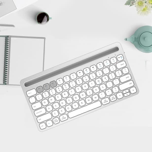 Ik8500 Multifunktionel bærbar Bluetooth-tastatur til computer, telefon og tablet (sølv)