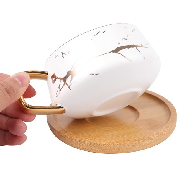 2 kpl Keramiikka Tee- ja Kahvikuppeja, 10 OZ Kahvimuki 304 Ruostumattomasta Teräksestä Valmistetulla Lusikalla ja Bambualustalla, Marmori Espresso Kupit Latteelle, Valkoinen ja Musta