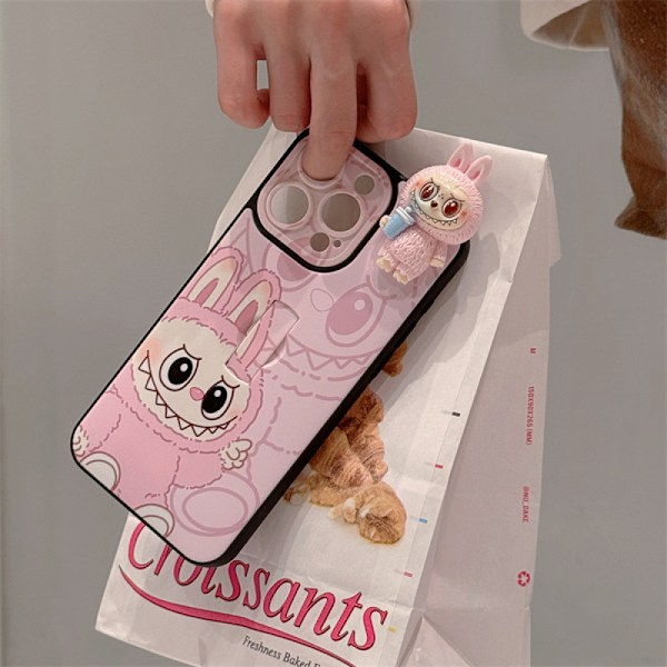 labubv 3D Hahmokännykkäkotelo: Pupujussikuosi jalustalla, sopii iPhone 11 - 16 -sarjoille ja niin edelleen (pinkki) pink iPhone12