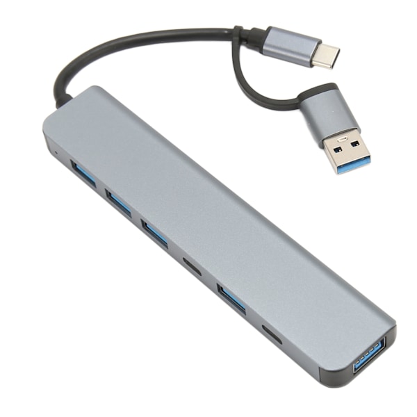 USB 3.0 USB C -keskitin 7-in-1 USB C -keskitin 5 USB 3.0 2 USB C -portti 7-in-1 moniporttisovitin Windows OS X -käyttöjärjestelmälle