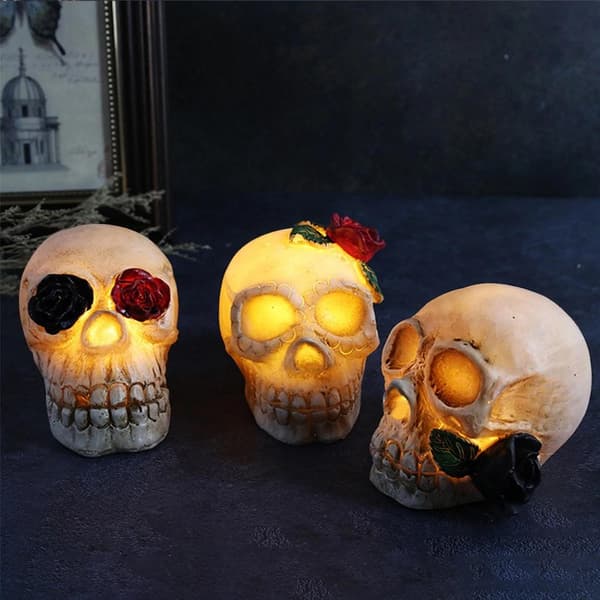 Create a spooky atmosphere with three skull lanterns!