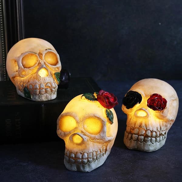 Create a spooky atmosphere with three skull lanterns!