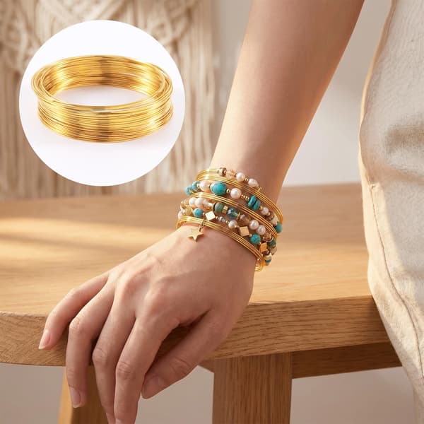 100 løkker 18K forgyldt memory wire, 0,57 mm perletråd til armbånd