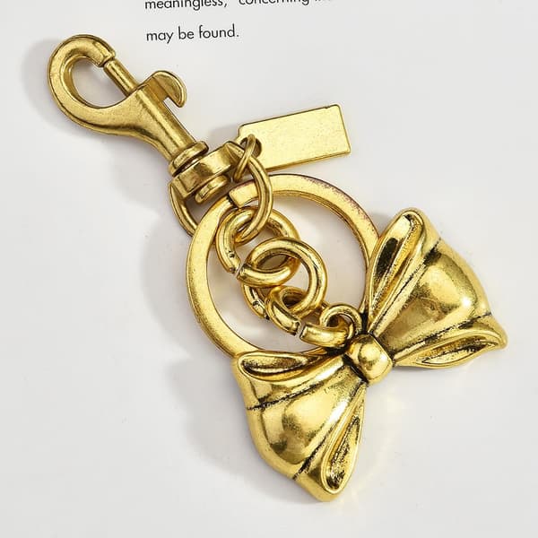 Väskberlock, söta handväskberlocker, väsktillbehörsberlocker, väskkedjor, handväskberlocker Knot-gold