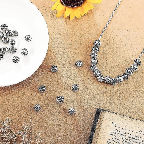40 delar Silver Tone Spacer Lösa pärlor Ihåliga Filigran Tibetan Beads Alloy Beads Spacer 12 Mm Tiny Metal Bea