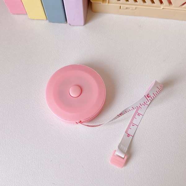 XJ-Kroppsmåttband, mjukt måttband, måttband för sömnad, måttband för tyghantverk, 150 cm rosa infällbart dubbelsidigt måttband