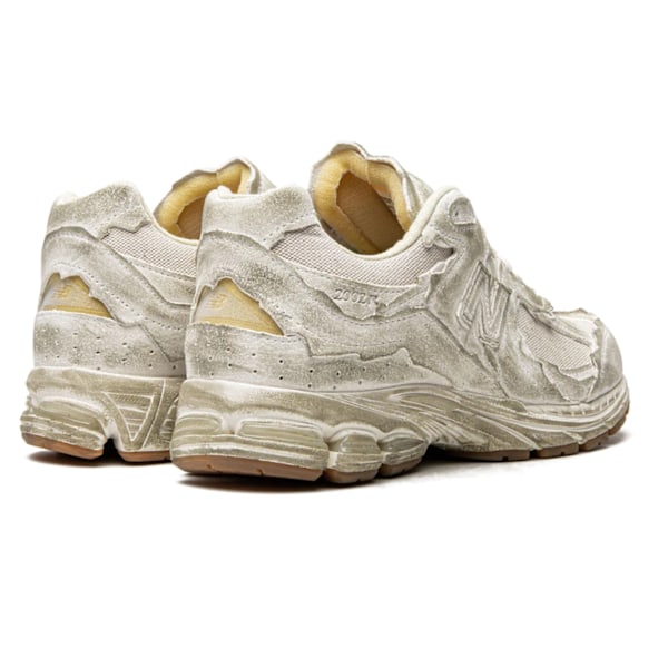 NEW BALANCES 2002R Protection Pack Distressed Original sneakers för män och kvinnor 45