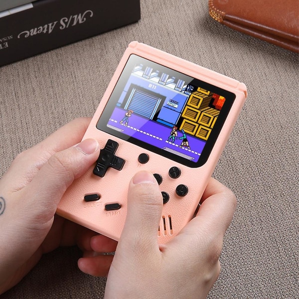 Voksne Barn Bærbar Retro Machine Mini Håndholdt videospillkonsoll Innebygd 500 i 1 Klassisk spill Morsomme leketøysgaver Pink