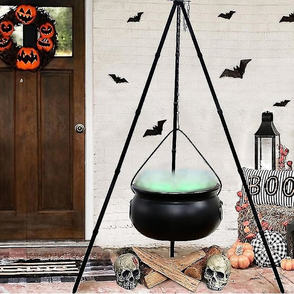 Halloweenin suuri noitakeitto kolmijalalla ja valoilla