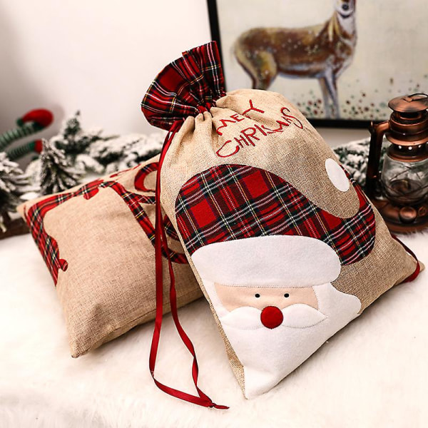 2 Pack Joulupukin joulukassit, Suuret pellavaiset joululaukut kiristysnyörillä lahjapakkaukseen, 56 x 39 cm uudelleenkäytettävä lahjapussi