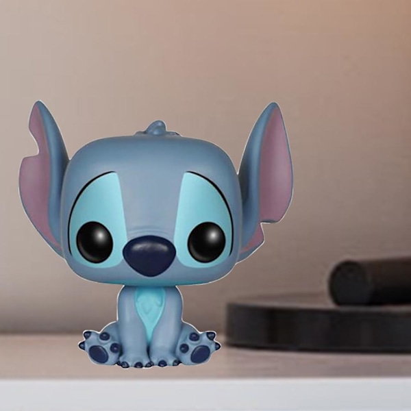 Funko POP! Dis--ney: Lilo & Stitch - Hymyilevä Istuva Stitch