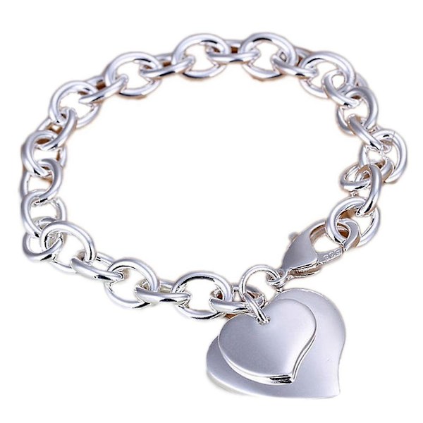 Nytt trendigt modesmycke hjärtformat armband med chianfärgad silverfärg
