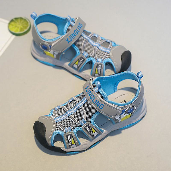 Barnsandaler Mode Halkfria strandskor Pojkar Flickor Antikrocktåhätta Cap Tx308 Blue 34