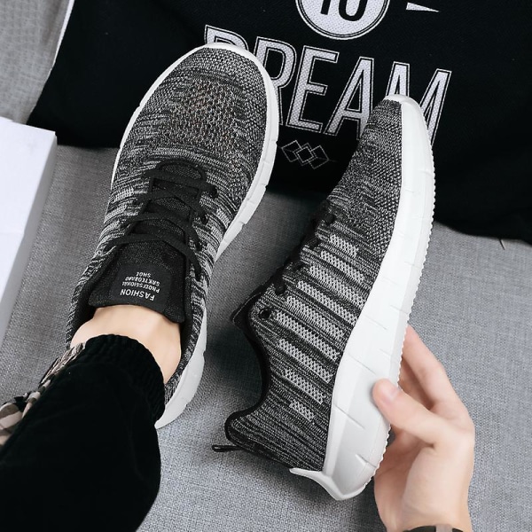 Sneakers för flugvävning för män Andas löparskor Mode sportskor 3A707 Gray 42