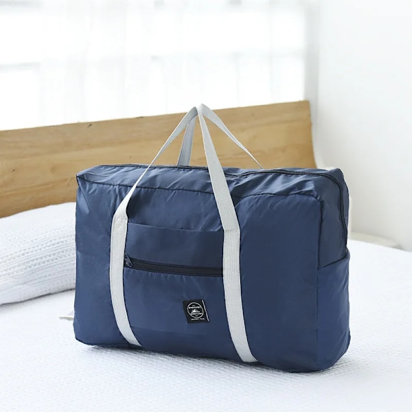 Sammenleggbar reiseveske i nylon for kvinner, stor kapasitet, skulderveske, vanntett unisex duffelbag navyblue