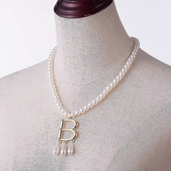 Anne Boleynin tyylinen tekohelmikaulakoru