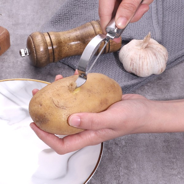 #Pivoterende rustfrit stål skræller med lodret blad#