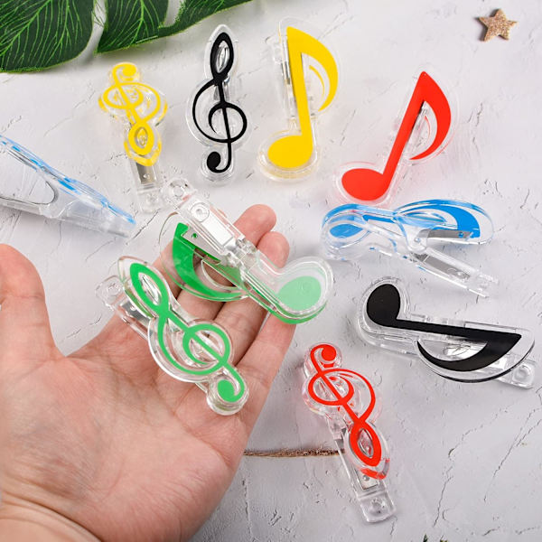 Sæt med 20 transparente plastik musiknoteformede clips til sider og noder blandet farve 5,20 stk